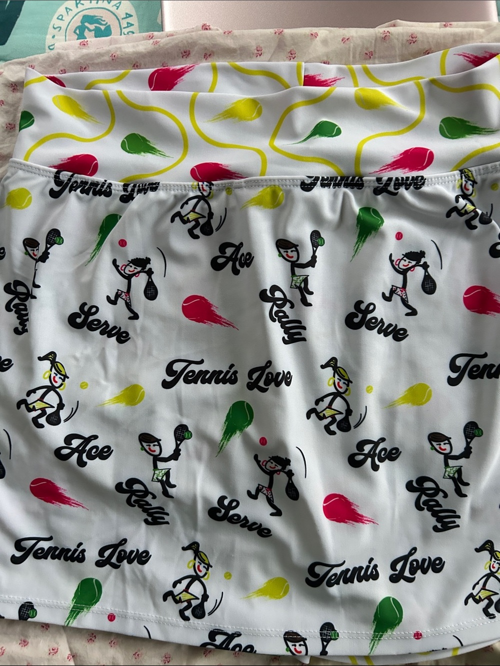 Skort Obsessed size small tennis logo. Fun print